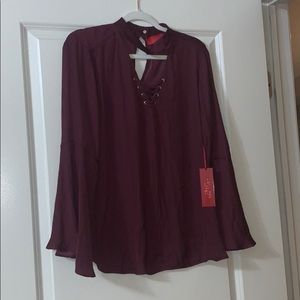 Jennifer Lopez lace up choker blouse